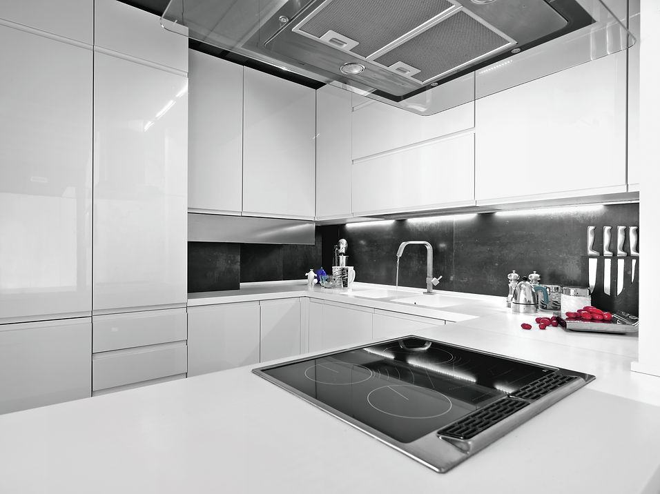 white modern kitchen with steel appliances