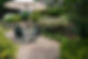 Secluded patio surrounded by flower gardens