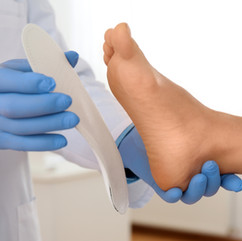 application of foot orthotic