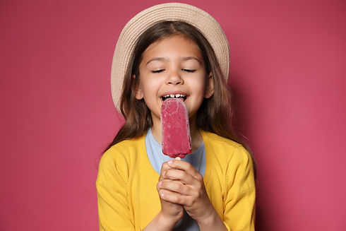 Girl Eating Popsicle
