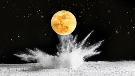 Golden full moon above a white splash against a dark starry background.