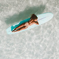Woman Surfboard Relaxation