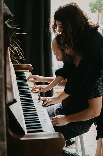 Couple Playing Piano