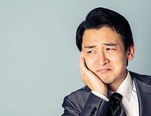歯痛の男性