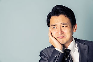 歯痛の男性