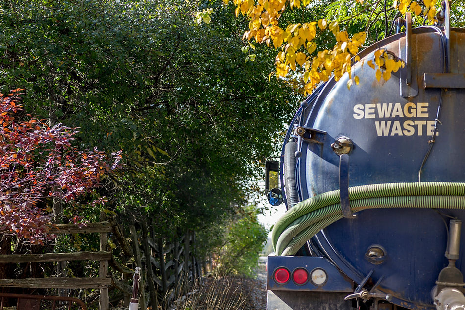 Septic pump truck used for waste removal and tank cleaning