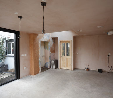 A main/ground floor of a residence undergoing a full home renovation.
