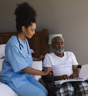 Caregiver Assisting Patient