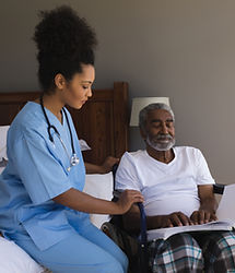Caregiver Assisting Patient