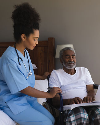 Caregiver Assisting Patient