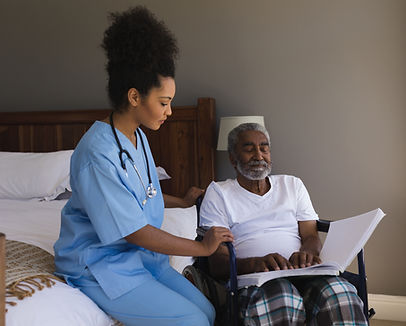 Caregiver Assisting Patient