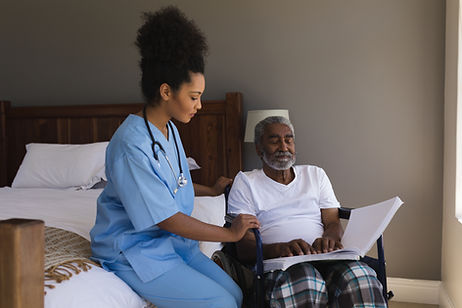 Caregiver Assisting Patient
