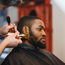 Barber Trimming Beard