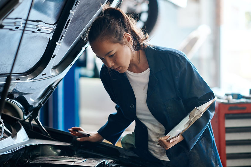 Mechanic Examining a Car