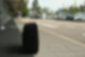 A travel bag near the roadside of an Airport