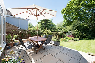 A bright patio with an outdoor dining set