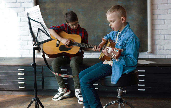 Boys play guitar
