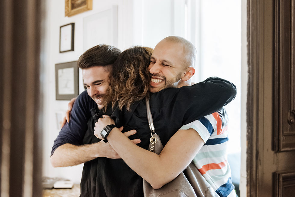 Couple Hugging Friend
