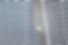 Venetian blinds on window, close up image focusing on window handle