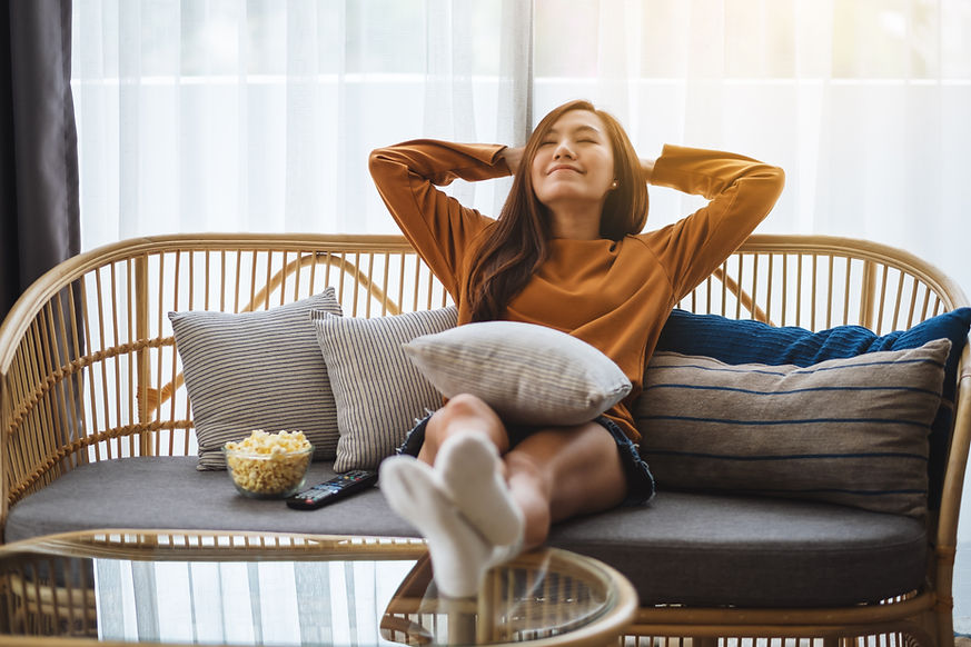 A girl relaxing on a couch