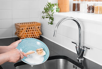 Person Washing Dishes