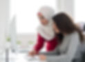 Student and Teacher at the Computer