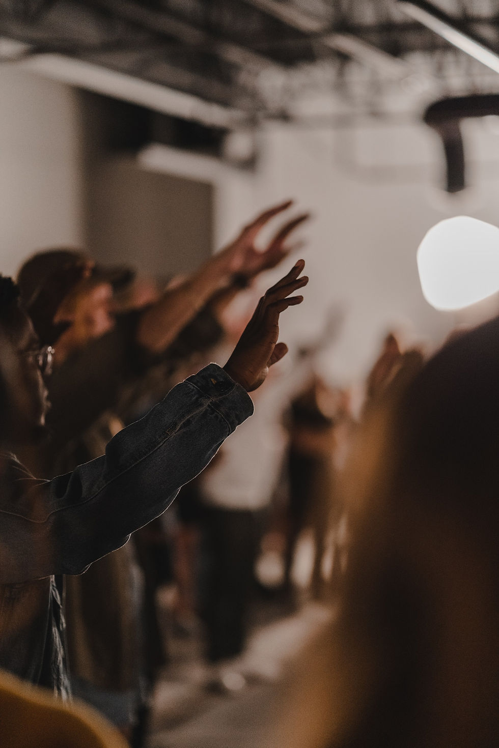 People Raising Hands