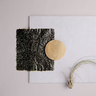 a slice of seaweed for wrapping sushi