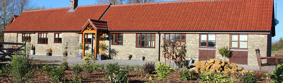 Stone Cottage with Red Roof