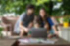 Family Using Laptop