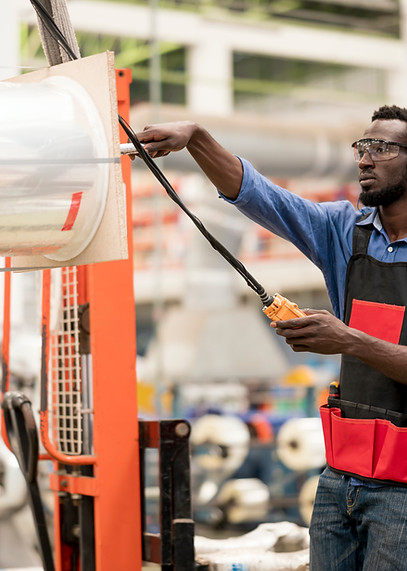 Industrial Worker Operating Machine