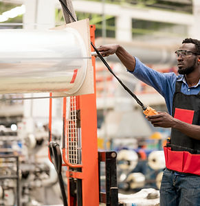 Industrial Worker Operating Machine