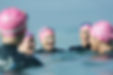 Swimmers talking in the sea