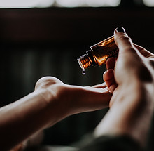 Hands with essential oil