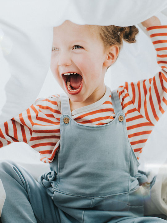 Child Laughing Playfully