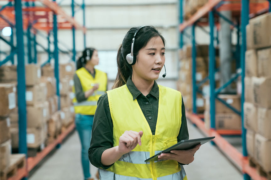 Warehouse Worker in Yellow Vest