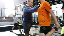two men stretching