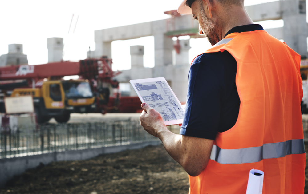 Male looking at a digital construction guide