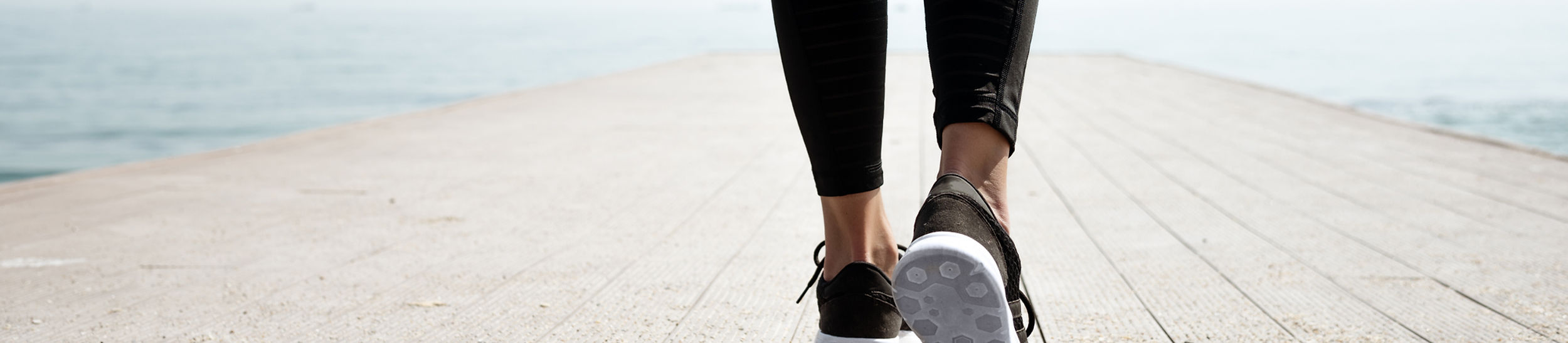 foot and ankle of woman walking