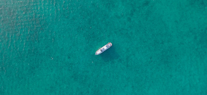 Boat In Turquoise Water