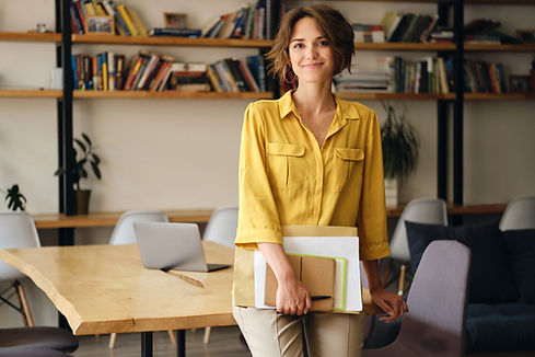 Person leaning against desk