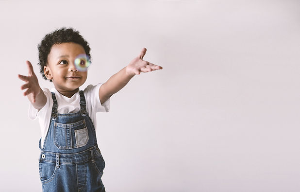 Kid Playing with Bubble