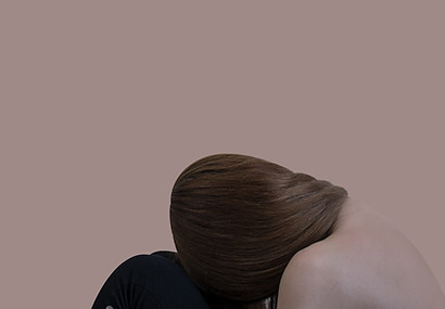 Woman finding comfort and reflection during grief therapy at Meer Soul Counseling, Arvada, CO.