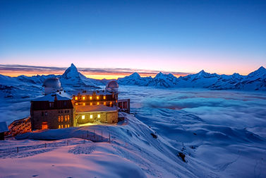 Alpine hut at sunrise