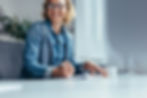 Smiling person with glasses