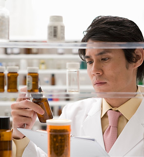 Pharmacist Checking Medicine