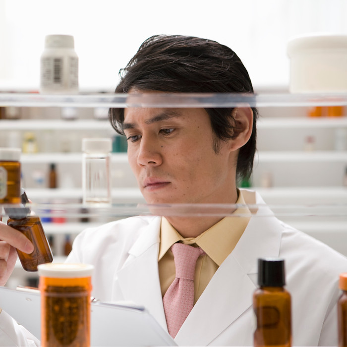 Pharmacist Checking Medicine