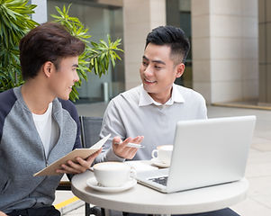 Two guys discussing between coffee time