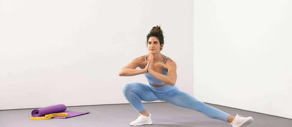 Mature woman stretching to reduce joint pain during menopause