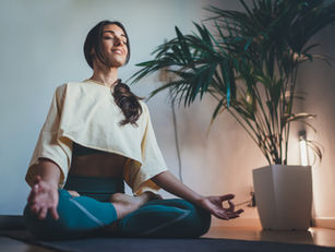 Women doing breathing yoga to reduce stress